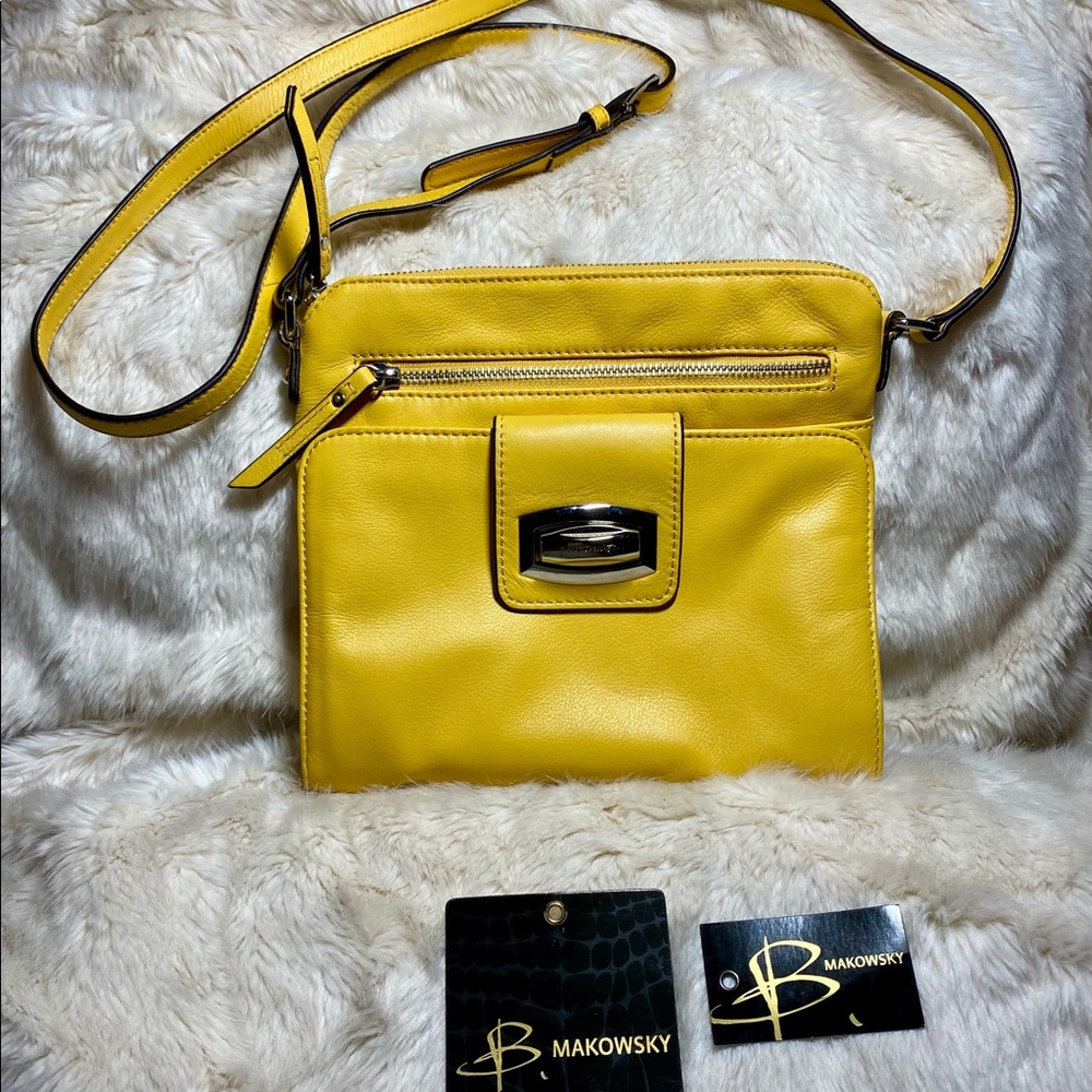 B Makowsky genuine leather Crossbody bag with built-in wallet. Yellow